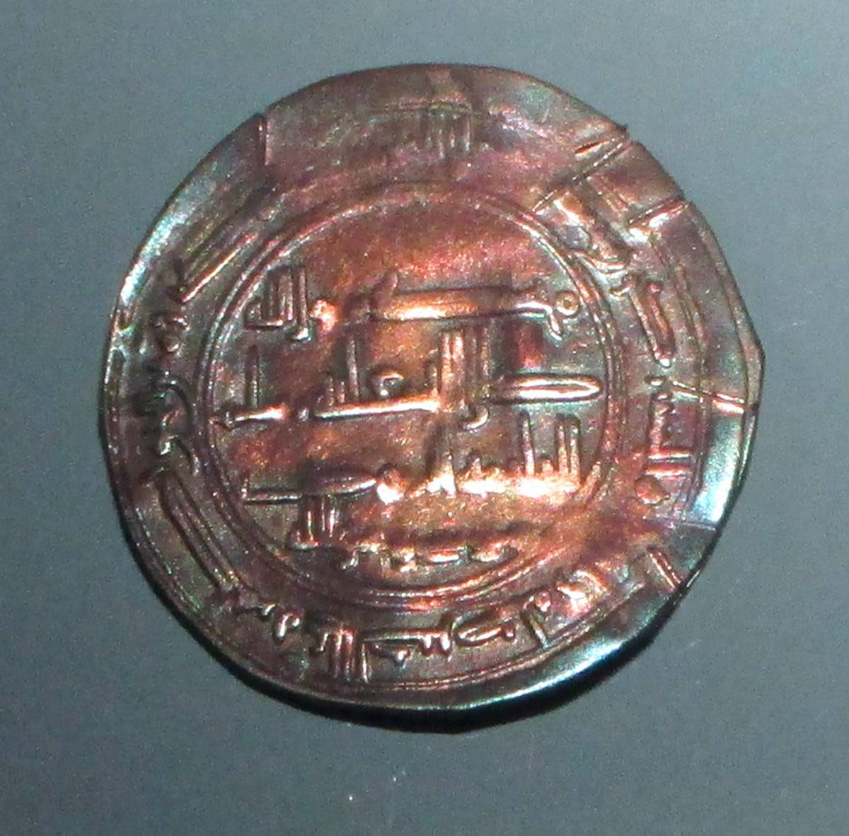 Khazar coin, the so-called Moses coin (830s CE), bearing the Arabic text "There is no God but Allah, and Musa (Moses) is His messenger." Such coins are seen as evidence that at least some of the Khazar elite had converted to Judaism.